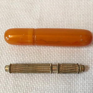Group of Sewing Items: Bone Lace Bobbins, Bakelite Needle Case, Gold Tone Walnut Sewing Kit