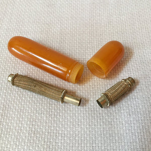 Group of Sewing Items: Bone Lace Bobbins, Bakelite Needle Case, Gold Tone Walnut Sewing Kit