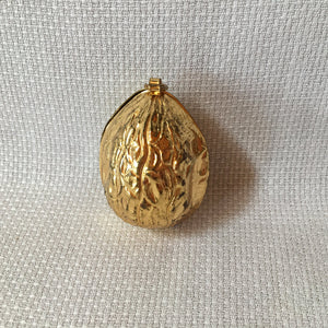 Group of Sewing Items: Bone Lace Bobbins, Bakelite Needle Case, Gold Tone Walnut Sewing Kit
