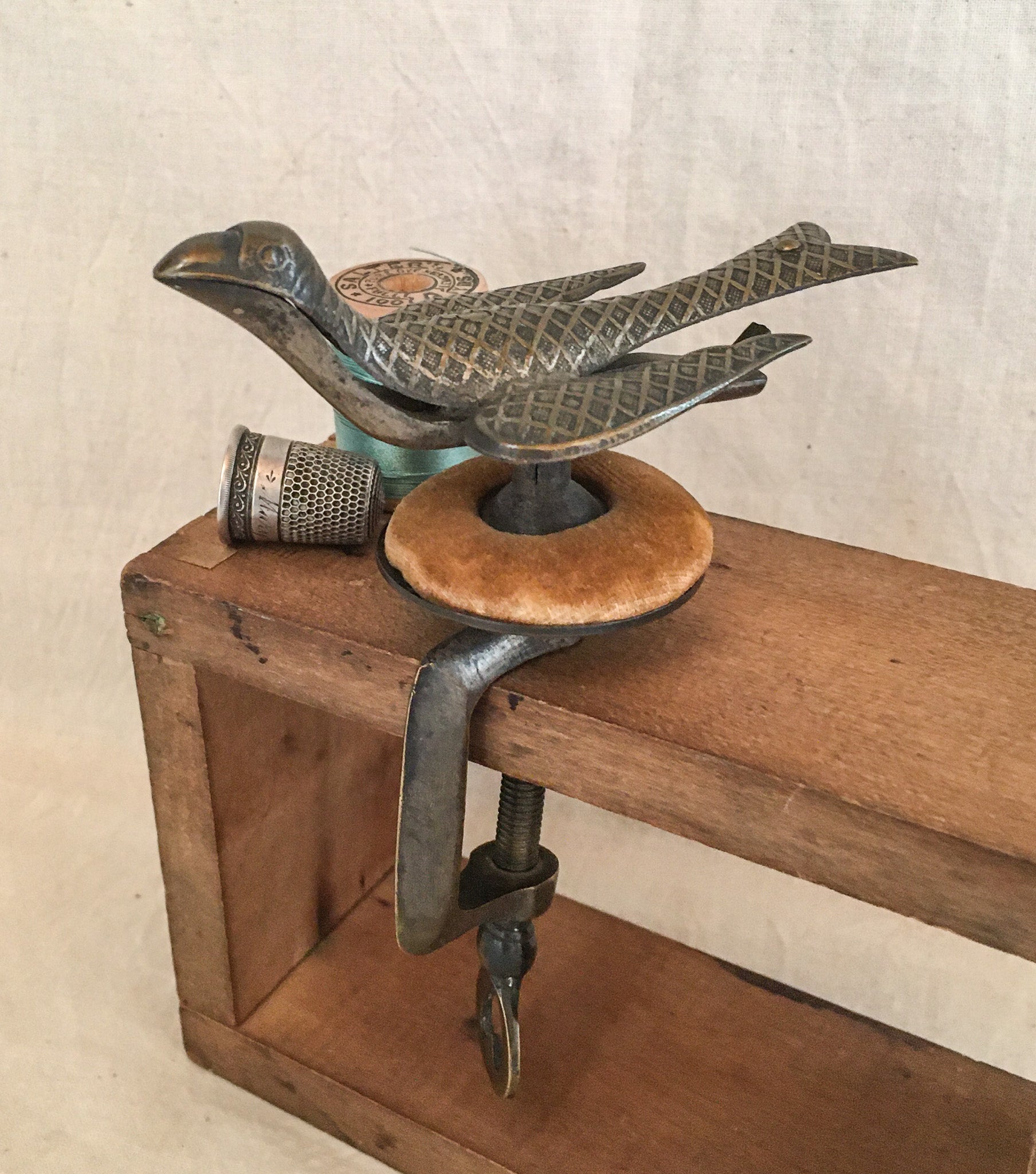 Early Brass Sewing Bird with Original Pin Cushion