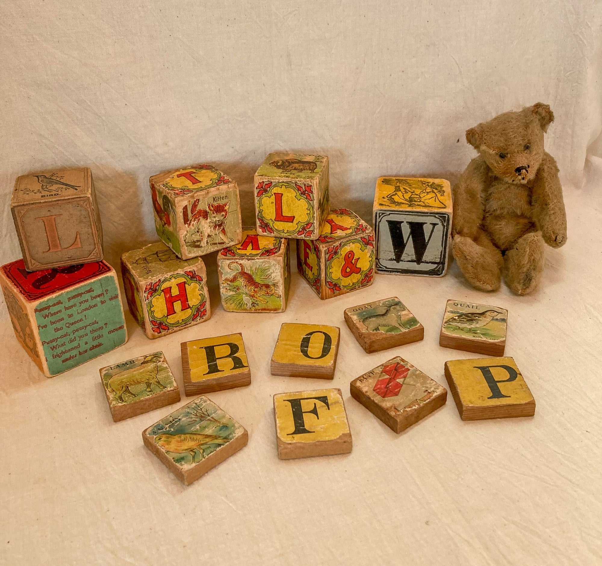 Antique Measure with Lithograph Children’s Blocks, Toy Dog and Doll Bottle