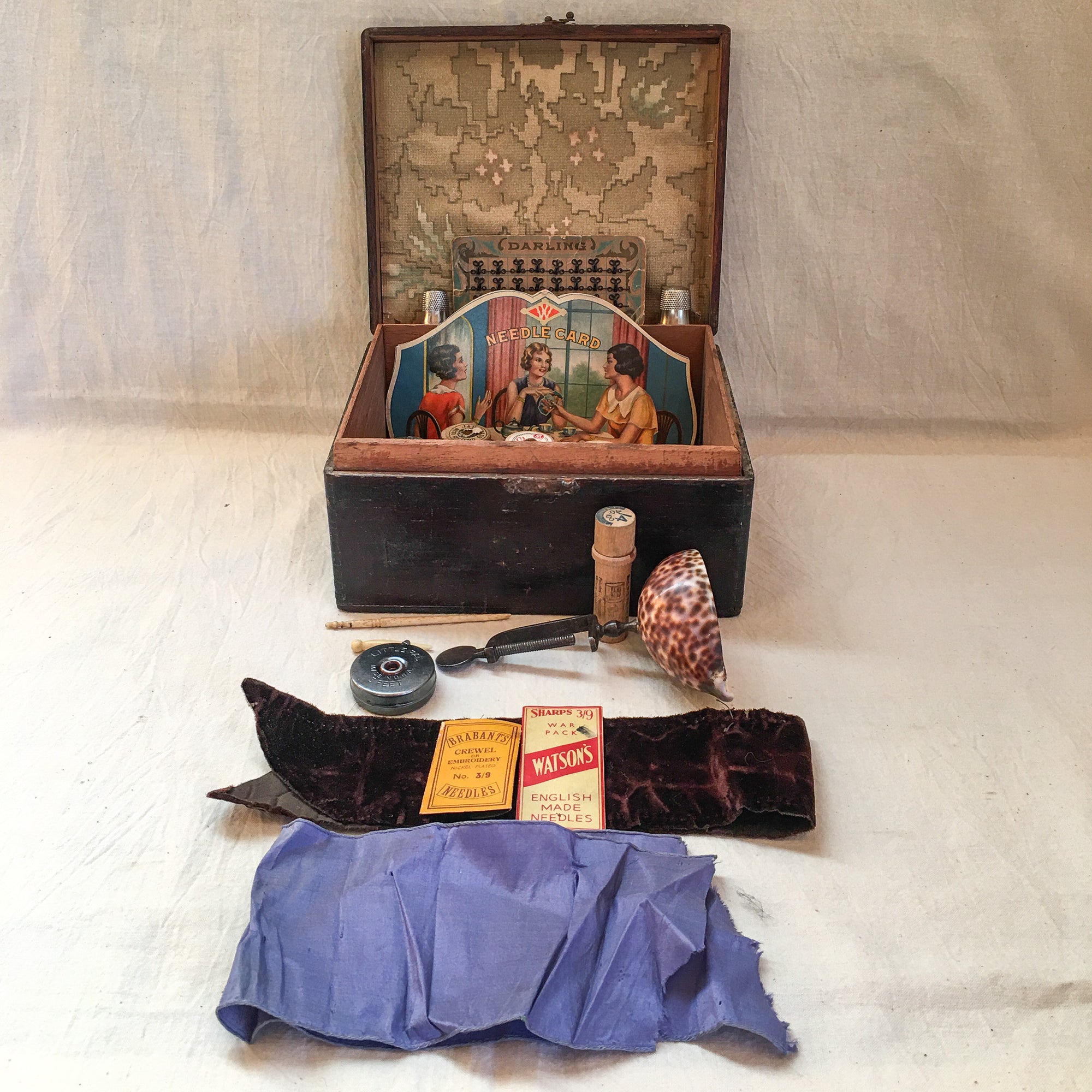 Pair of Sewing Boxes with Contents, Including Shell Sewing Clamp