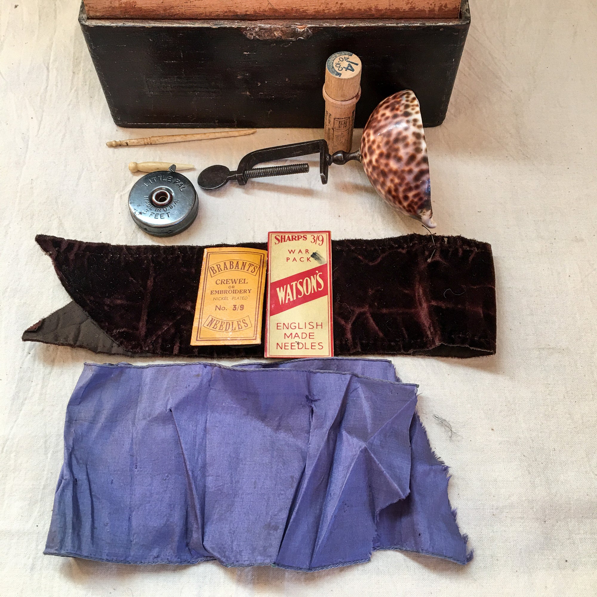 Pair of Sewing Boxes with Contents, Including Shell Sewing Clamp