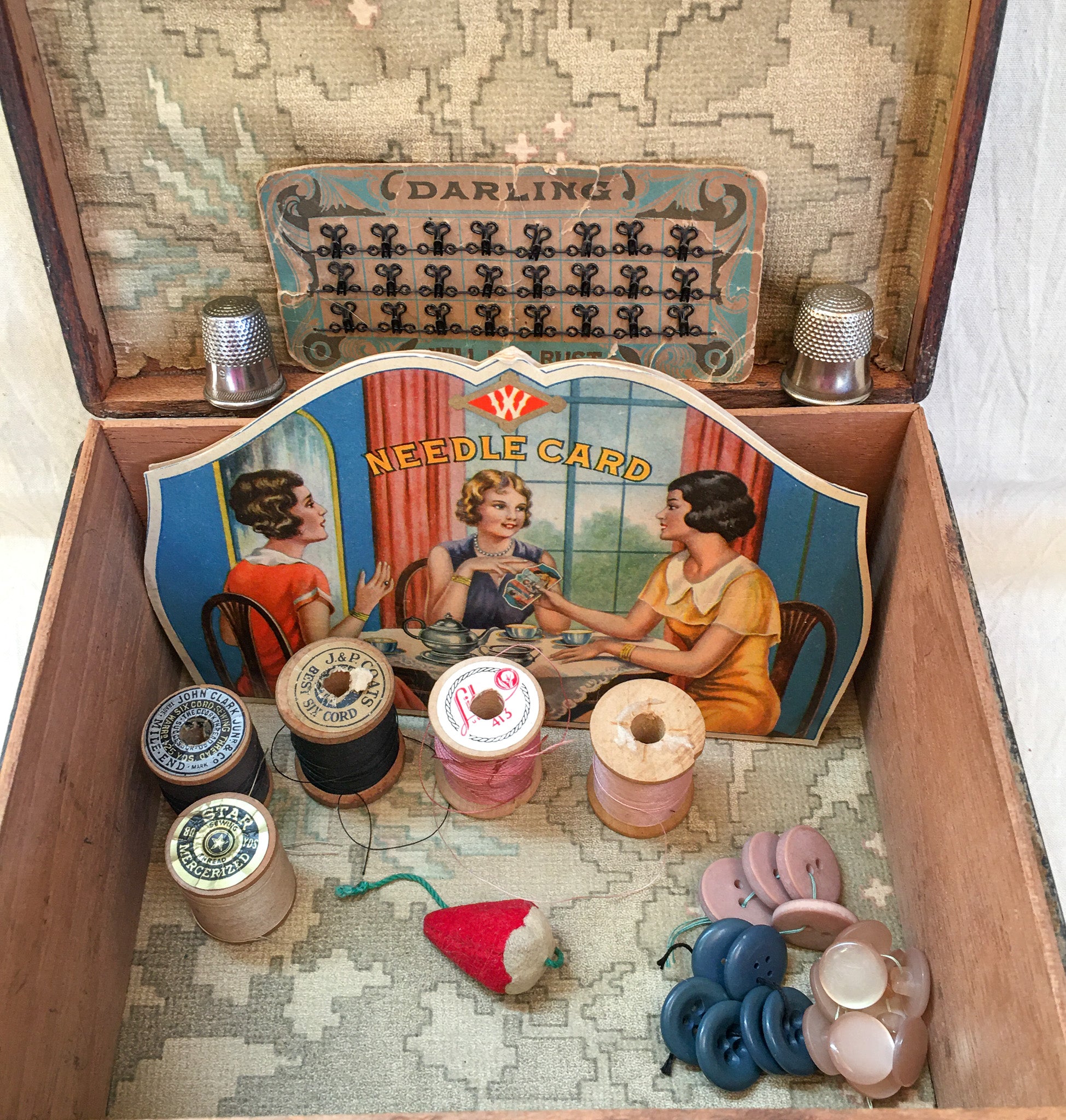 Pair of Sewing Boxes with Contents, Including Shell Sewing Clamp