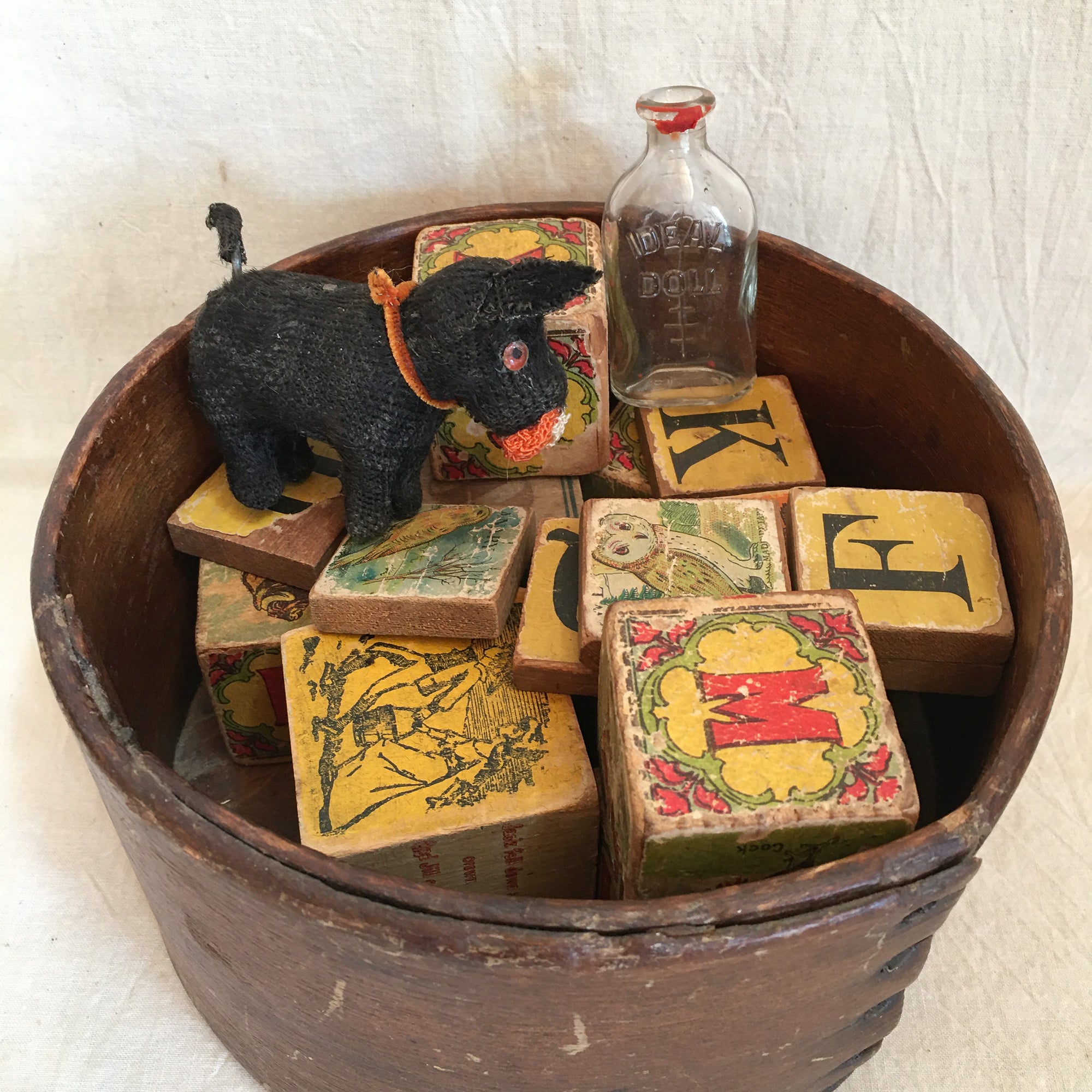 Antique Measure with Lithograph Children’s Blocks, Toy Dog and Doll Bottle