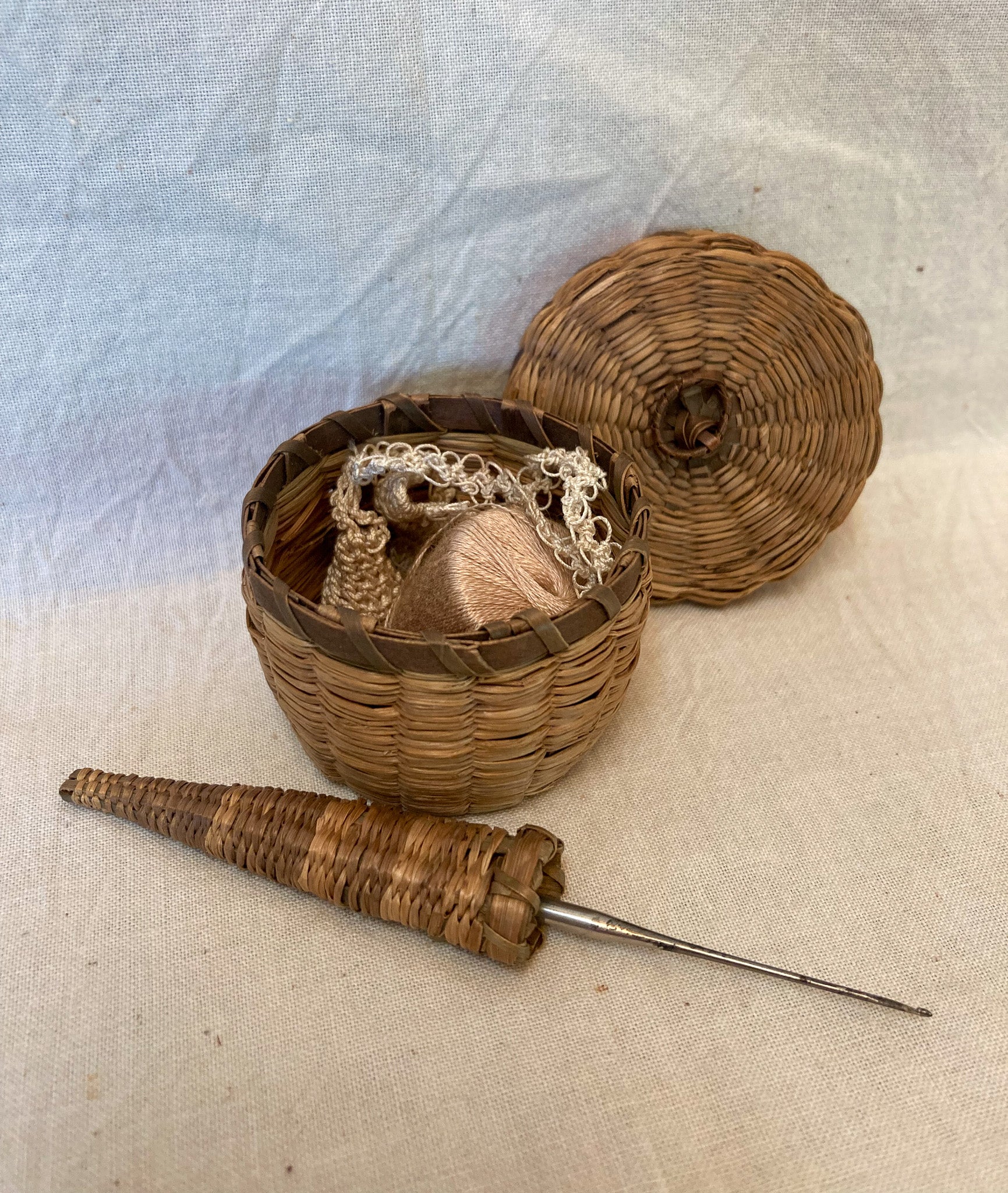 1910’s Tiny Woven Sweet Grass Basket and Crochet Hook Holder with Contents