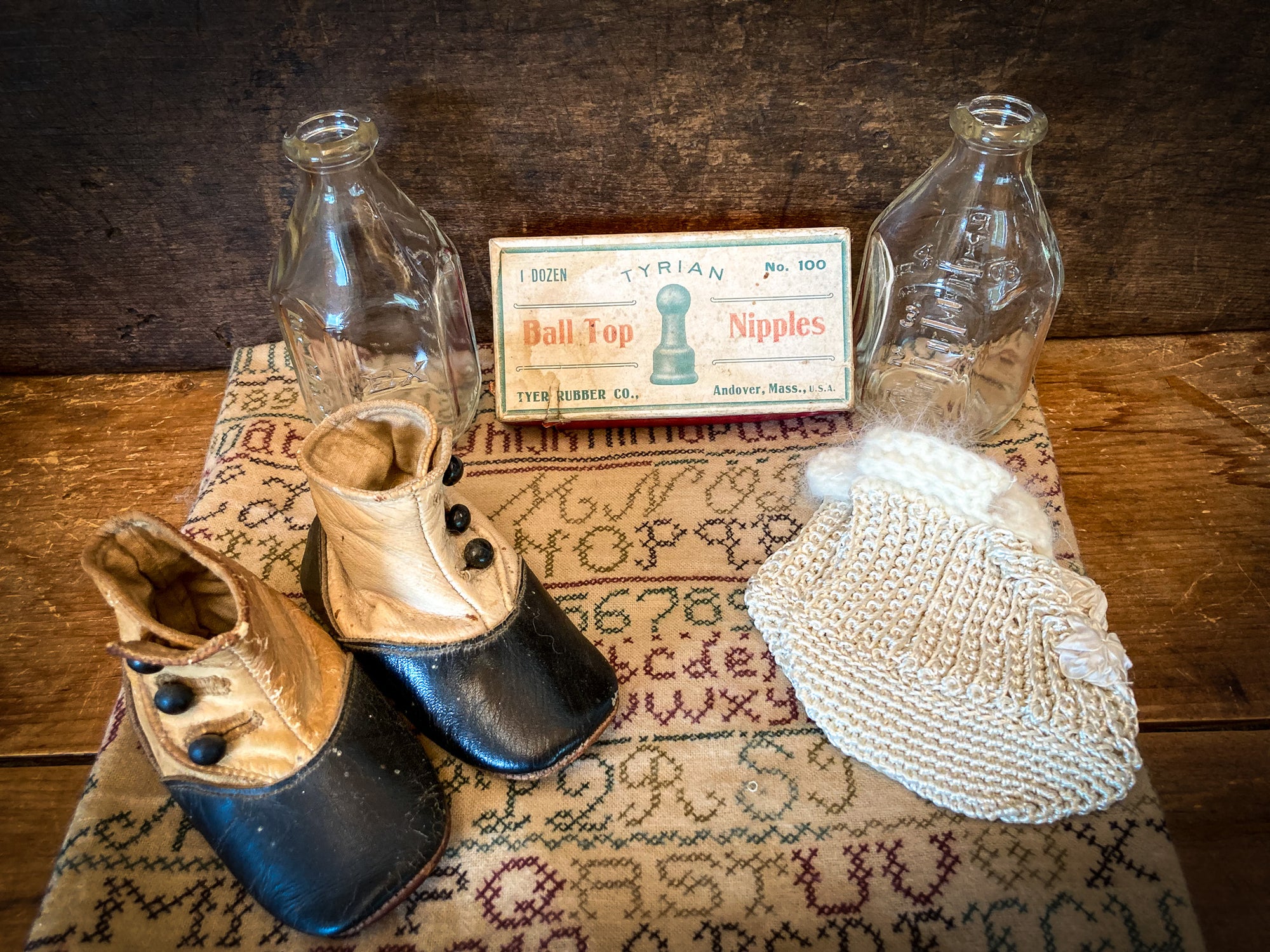 Vintage Baby!  2 Mid Century Pyrex 4 oz Bottles, Leather Baby Shoes, Silk and Angora Baby Booties, Advertising Box Top for Nipples