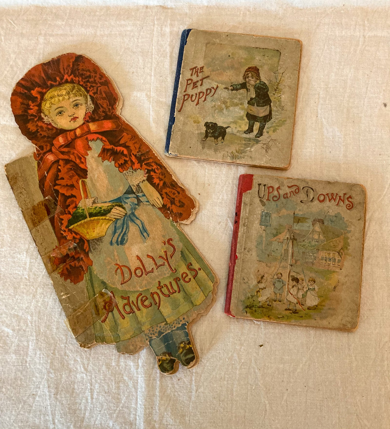 1895 “Dolly’s Adventures” and 1890 “The Pet Puppy” and “Ups and Downs”