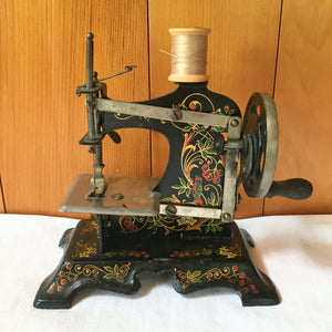 Antique German Toy Sewing Machine – Painted Cast Iron, Floral & Bird Design – c. 1920s