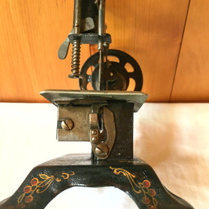 Antique German Toy Sewing Machine – Painted Cast Iron, Floral & Bird Design – c. 1920s
