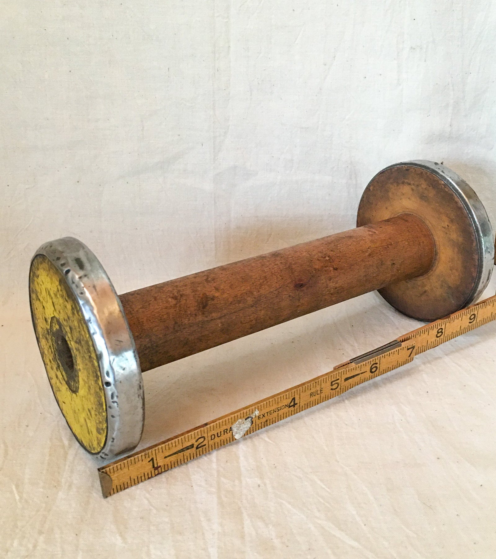 Large Wooden Spool, 9 ¼” Long, Yellow Paint