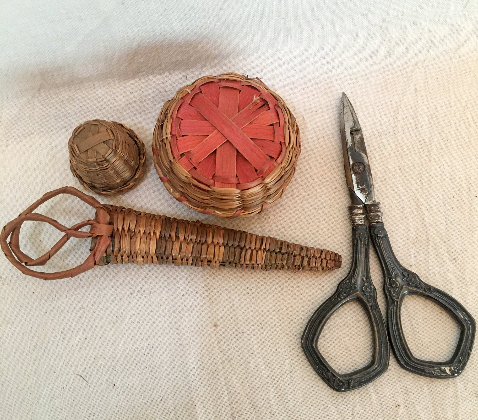 1910’s – 1930’s Woven Sweet Grass Pincushion, Thimble Basket, and Scissor Basket with Sterling Scissors and Simons Bros Sterling Thimble