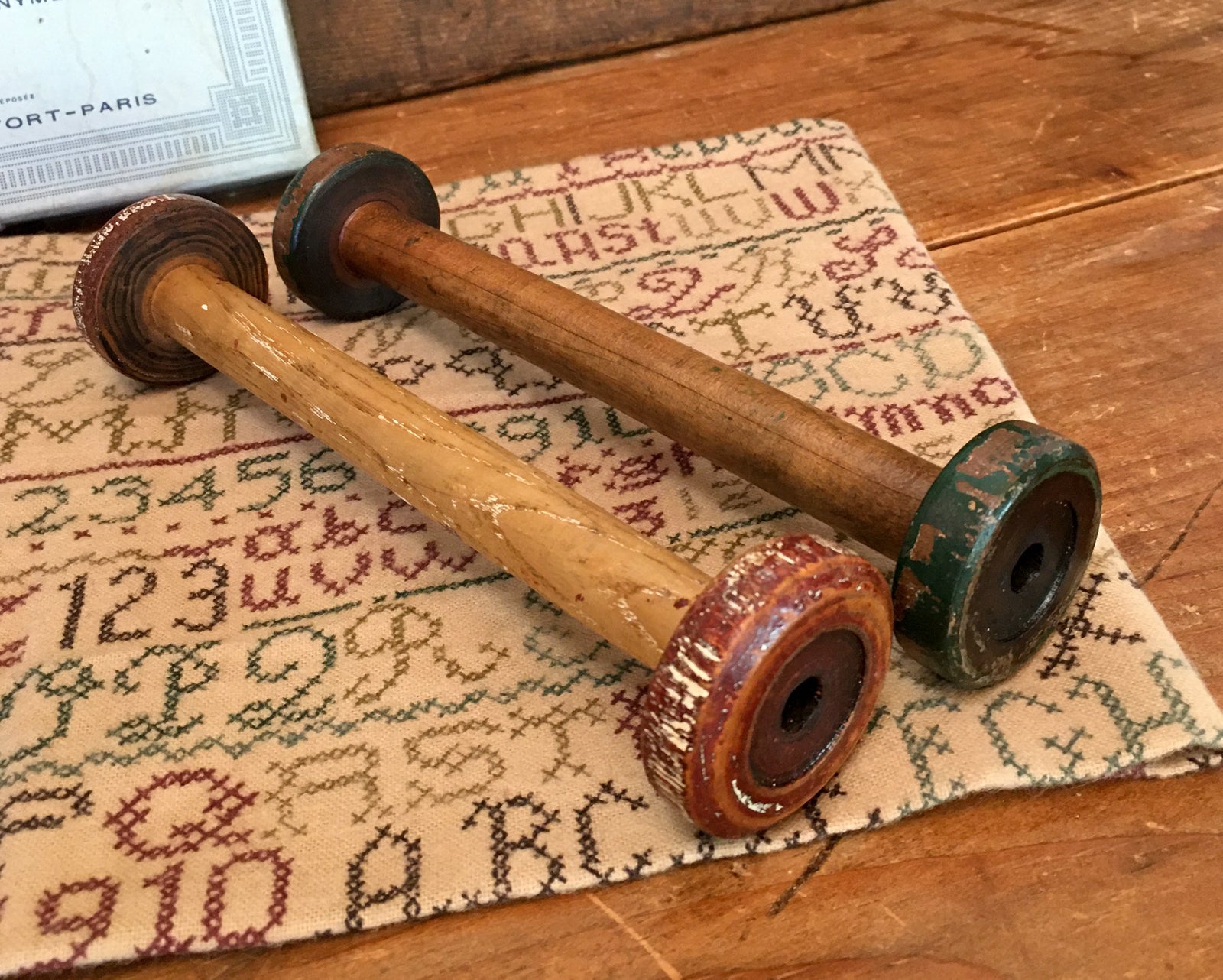 Set of 2 Wooden Spools, Red and Green, 7” long