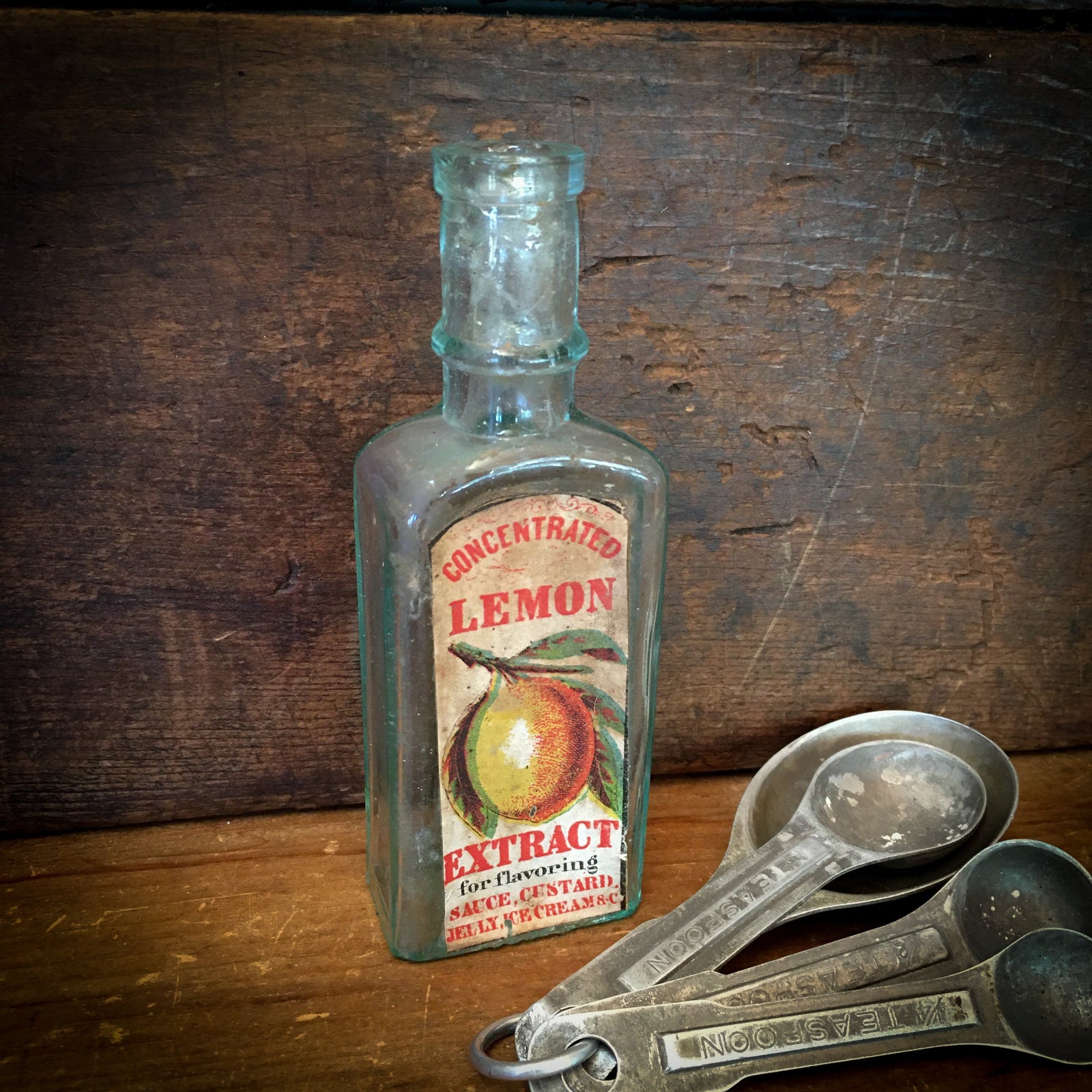 Antique Lemon Extract Bottle with Lithograph Label