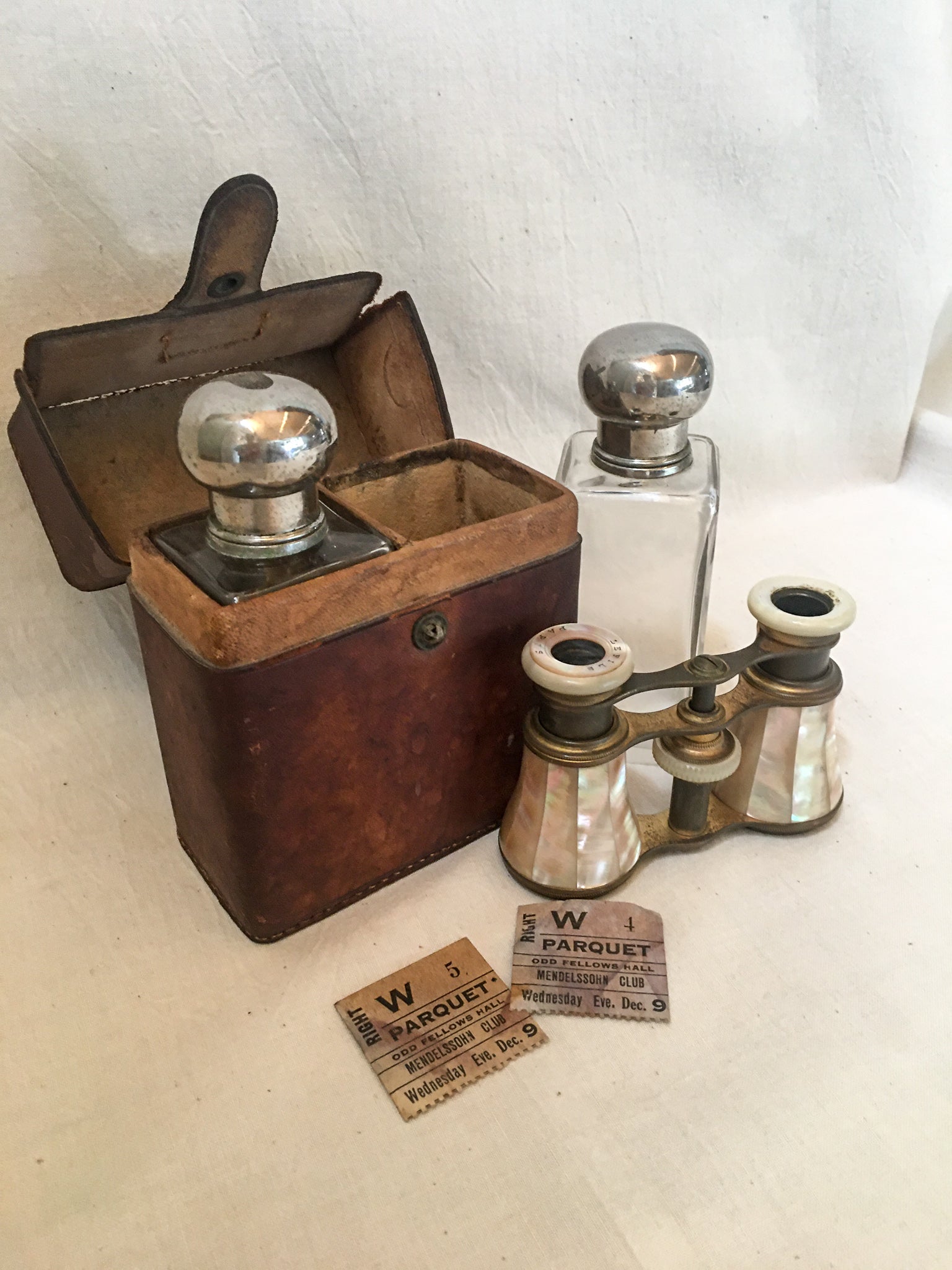 A Night Out: 1920’s Medicine Bottles with Silver Tops, in a Leather Travel Case AND 1910’s LeFils Paris Mother of Pearl Opera Glasses