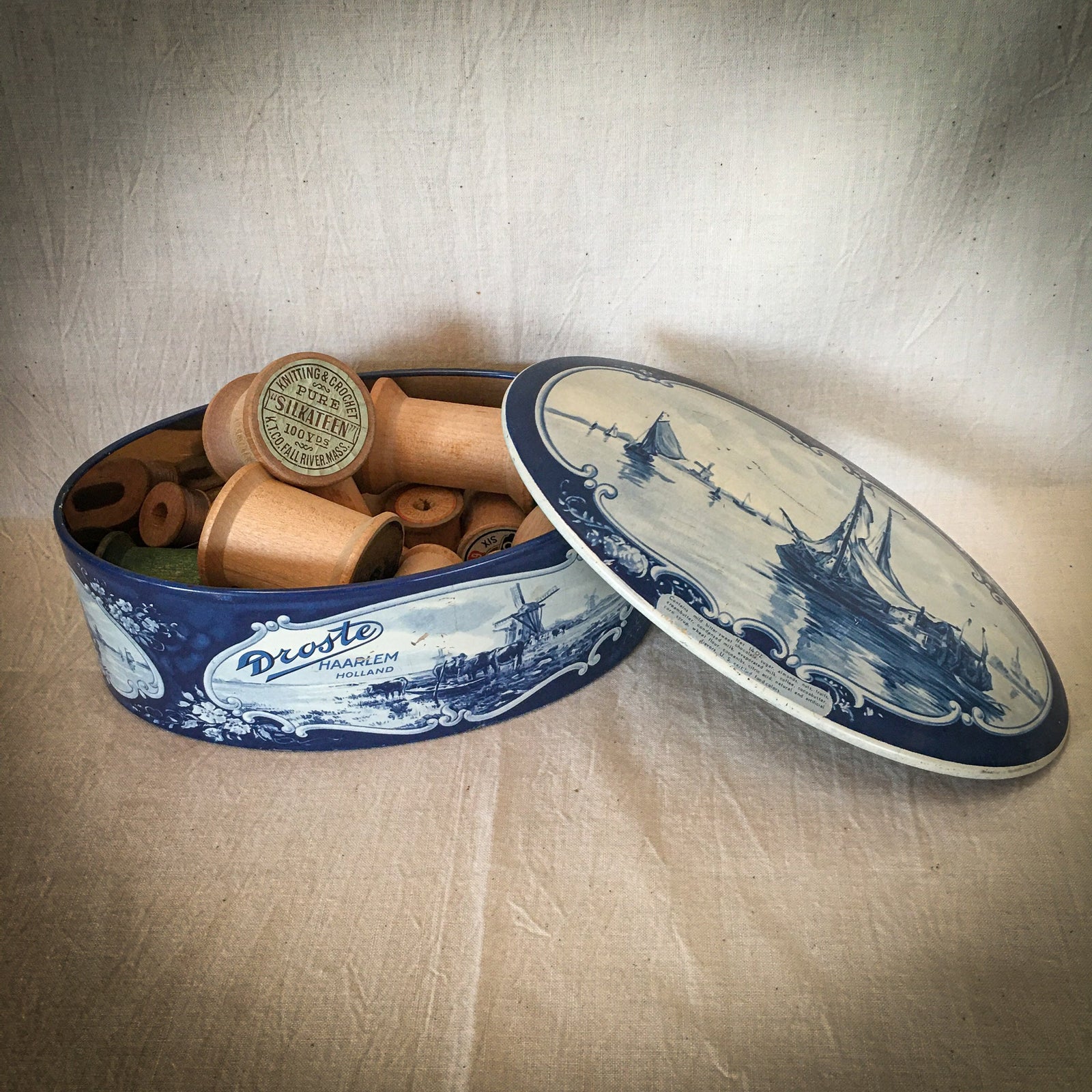 Vintage Tin with 18 Wooden Thread Spools